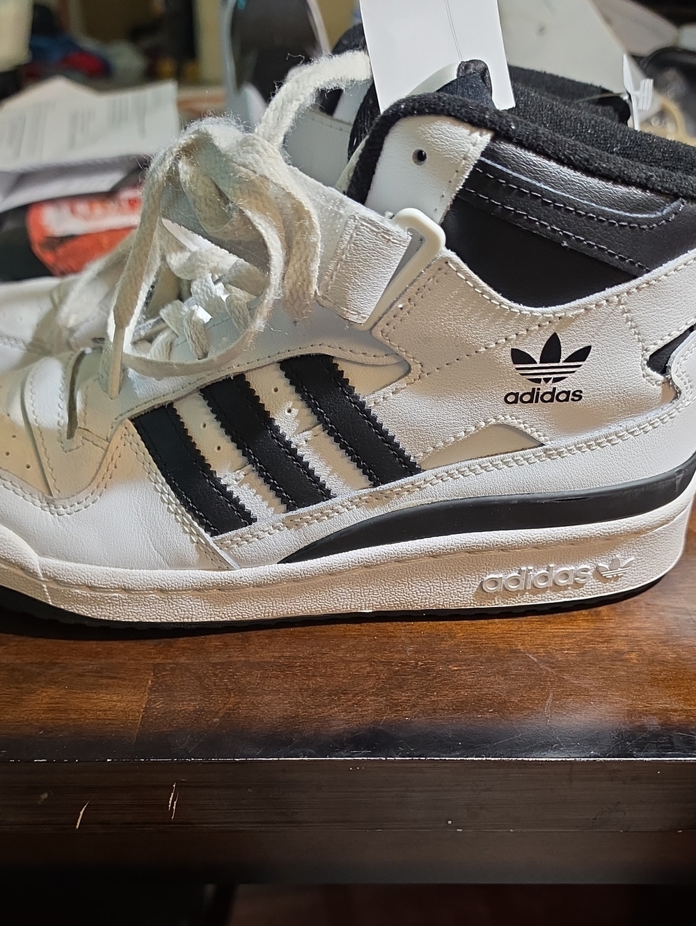 adidas White and Black Mid-Top Sneakers with Three Stripes